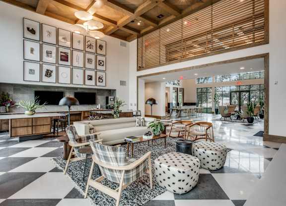 A living room with a black and white checkered floor.