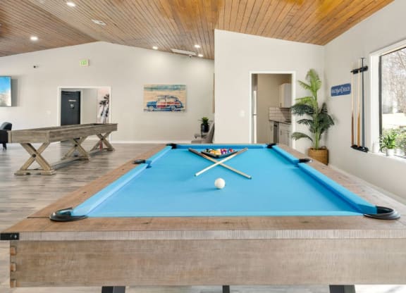 a pool table in the middle of a room