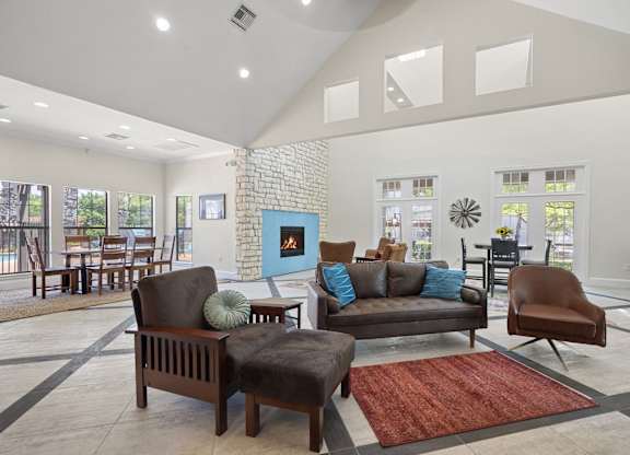 A living room with a fireplace and a couch.