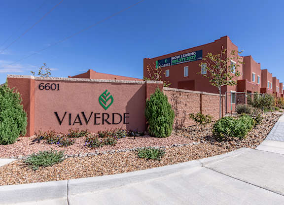 The image shows a brick building with the name VIAVERDE and the number 6601 on it.