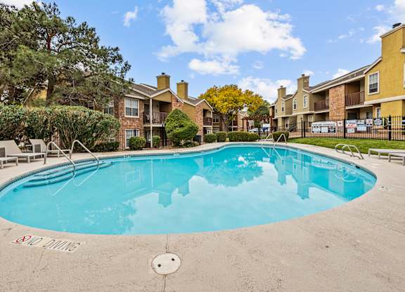 the preserve at ballantyne commons community swimming pool with apartment buildings