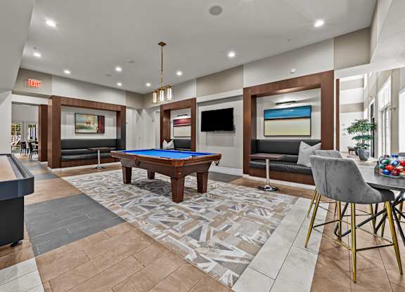 unleash the fun in our game room with a pool table