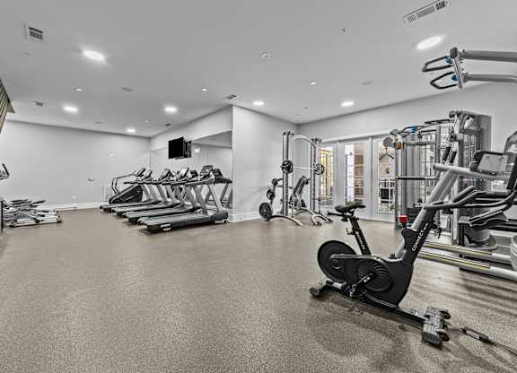 the gym has cardio machines and weights in it