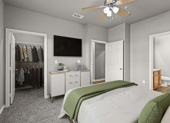 A bedroom with a bed, dresser, and a television.