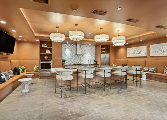 A modern dining room with a large table and chairs.