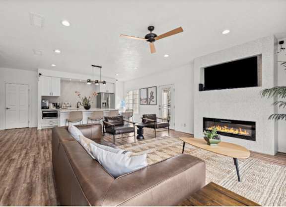 a living room with a couch and a fireplace