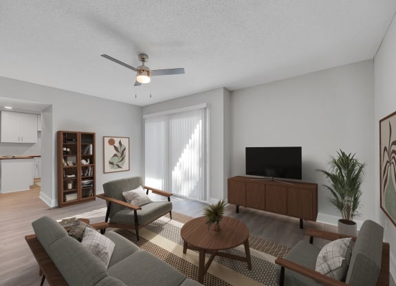 a living room with a couch and a table and a tv