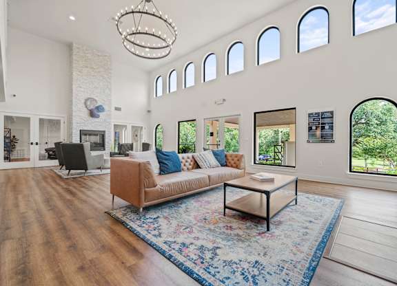 a living room with a fireplace and a couch