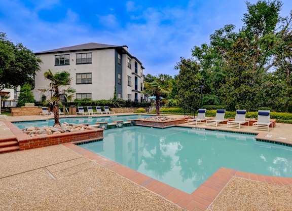 our apartments have a resort style pool with lounge chairs