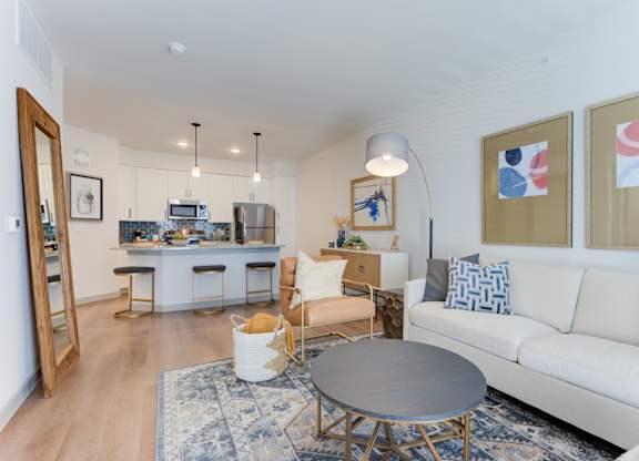 a living room with a couch and a table