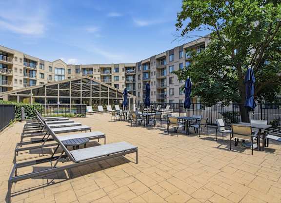 A sunny day at the outdoor seating area of a hotel.
