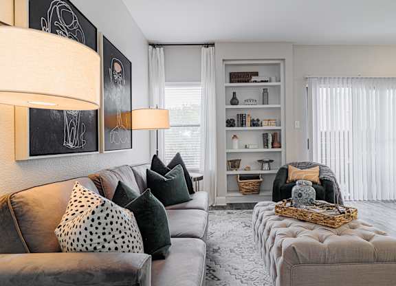 a living room with a couch and a chair