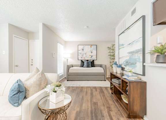 a living room with a couch and a coffee table