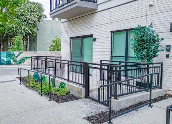 a building with a ramp leading up to the door