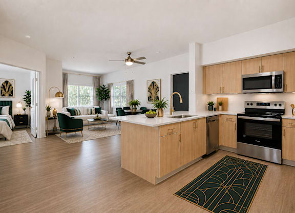 A modern kitchen with wooden cabinets and a large island.