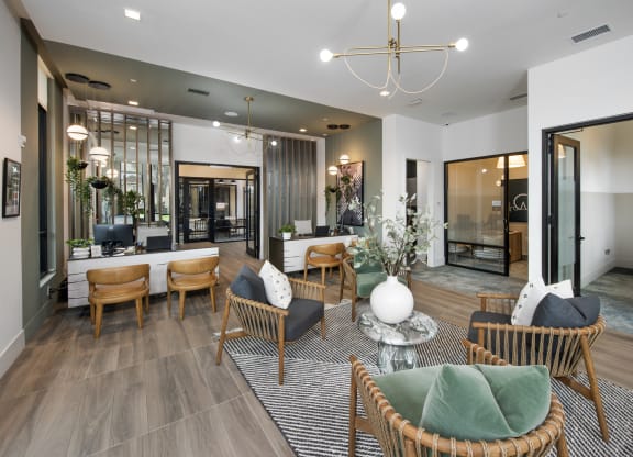 a living room with a table and chairs
