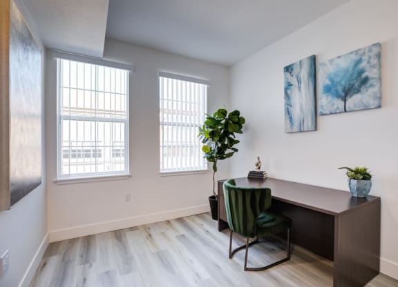 the preserve at ballantyne commons living room with desk and chair and windows