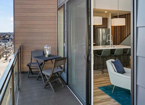 Balcony with slider door to living room