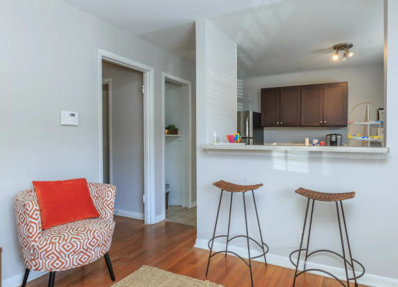 a kitchen and living room in a 555 waverly unit