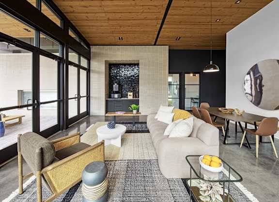 a living room with a couch and a table