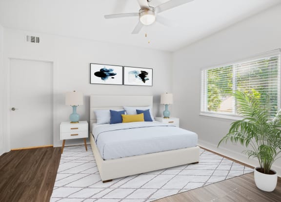 A white bedroom with a full sized bed and mattress
