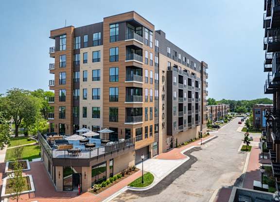 A modern apartment building with a courtyard in the middle.
