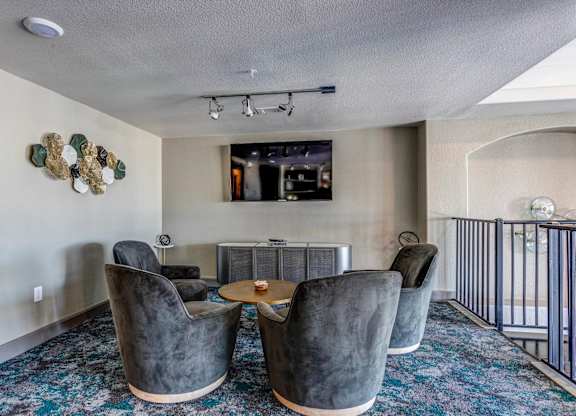 a living room with couches and a table