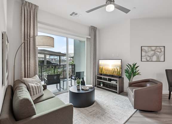 Living Room with Plant at Coya Apartments, Las Vegas, NV, 89102