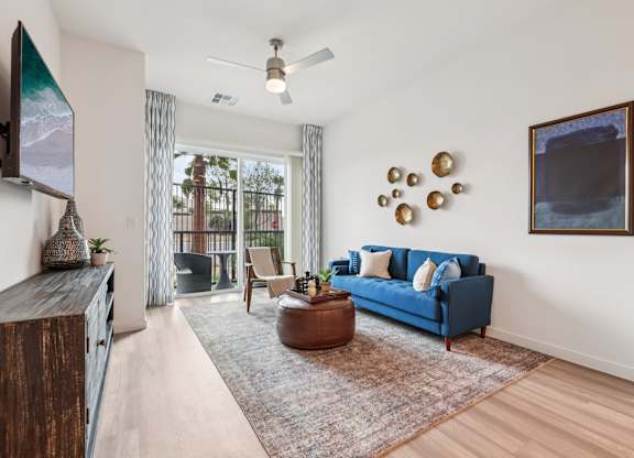 Living Room with TV at Coya Apartments, Las Vegas, Nevada