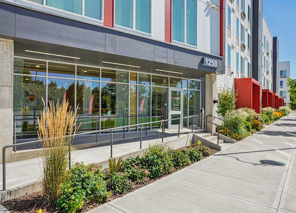 Modern building with glass facade at Hana Apartments, Oregon, 97006