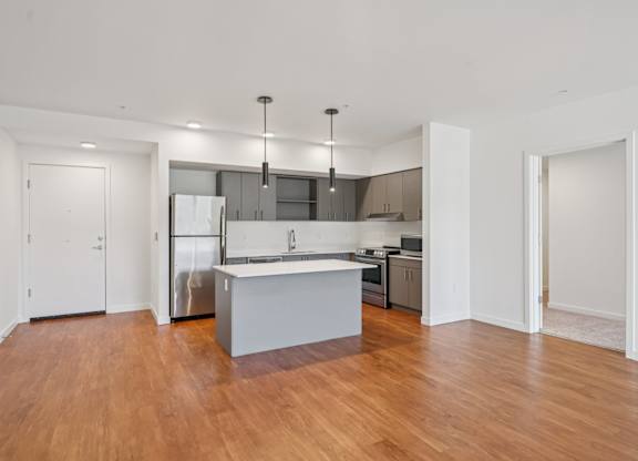 Kitchen with white Island at Hana Apartments, Hillsboro, OR, 97006