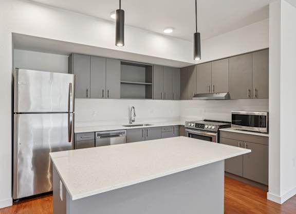 Kitchen with cabinets at Hana Apartments, Hillsboro, Oregon
