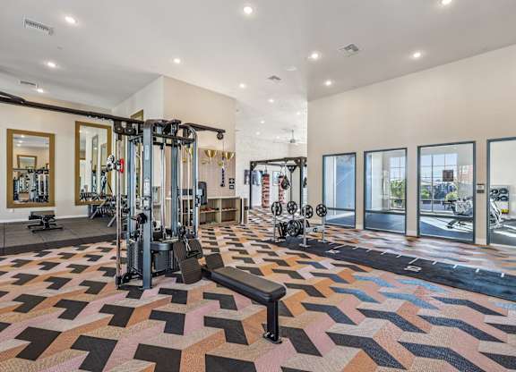 A gym with a variety of equipment at Fora Apartments, Las Vegas, NV 89183