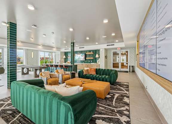 A Couch with Green Line Pattern at Coya Apartments, Las Vegas, NV