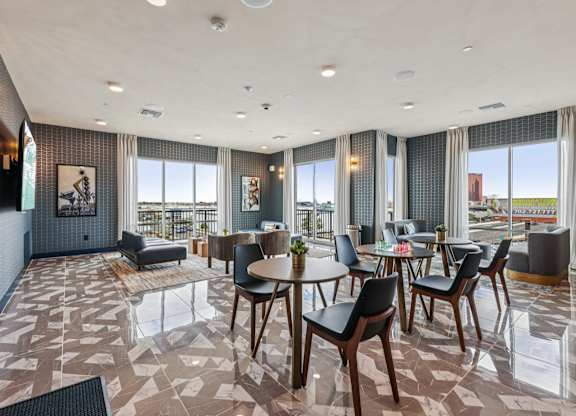 Tables and Chairs in a Room at Coya Apartments, Nevada