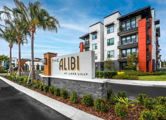 the albi at lakeshore apartments sign in front of building