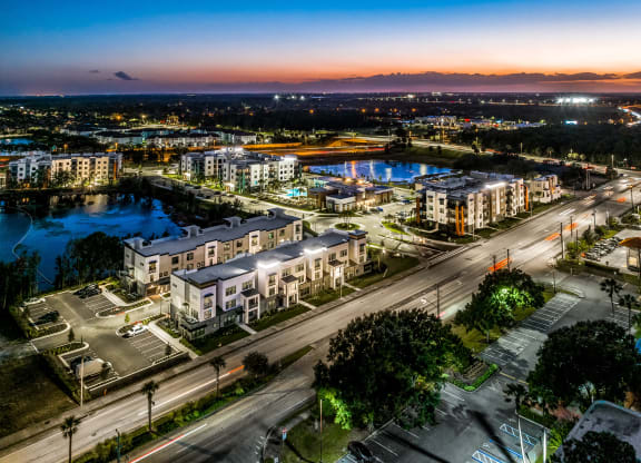 an aerial view of a city at night