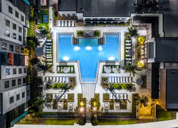 a birds eye view of a hotel with a pool in the middle of a building at The Alibi at Lake Lilly, Ocoee, FL