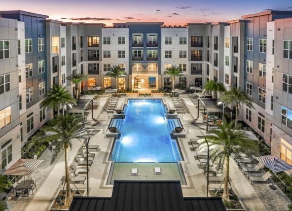 an overhead view of an apartment building with a swimming pool at The Overlook, Winter Garden