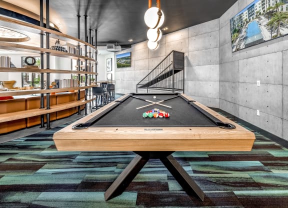 a pool table in a game room with a billiardsat The Overlook, Winter Garden