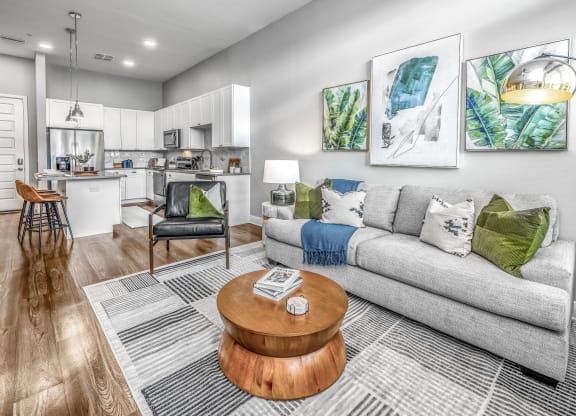a living room with a couch and a coffee table at The Overlook, Winter Garden, FL