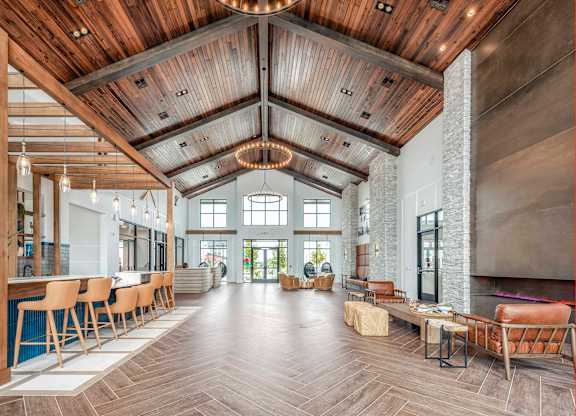 A large open space with wooden floors and a high ceiling.