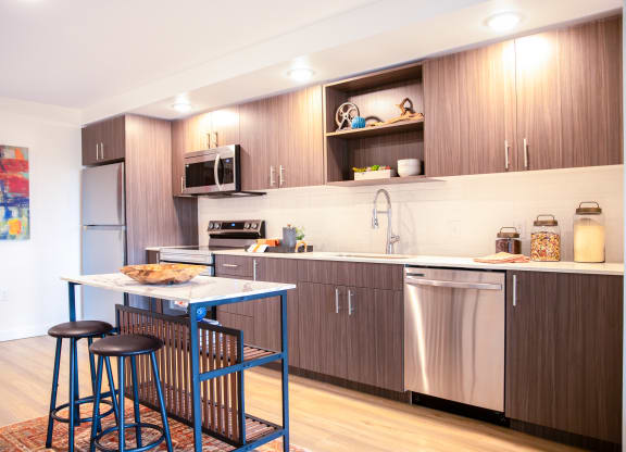 a kitchen with a small table and two stoolsat Scouter's Mountain, Happy Valley, 97086
