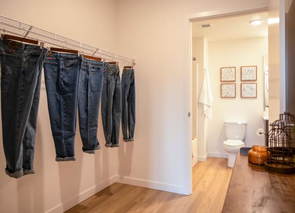 a row of jeans hanging on a rack in a bathroomat Scouter's Mountain, Happy Valley Oregon