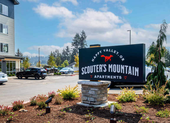 a sign for the scotts mountain apartmentsat Scouter's Mountain, Happy Valley, OR 97086