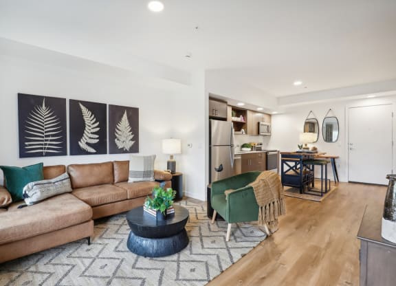 a living room with a couch and a table at The Mill on Maple Apartments, Oregon, 97045