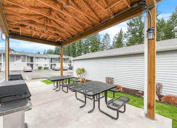 Covered Outdoor Seating Area at Maple Crossing Apartments, Maple Valley, 98038