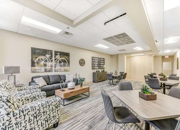 A conference room with a long table and chairs. at Academy at Drexel Apartments, Chicago, IL, 60637