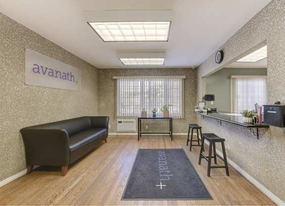 Well-lit office space at Acclaim at Baldwin Apartments, Los Angeles