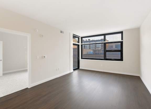 Empty room with a door and a window. at Affinity at 2M, Washington